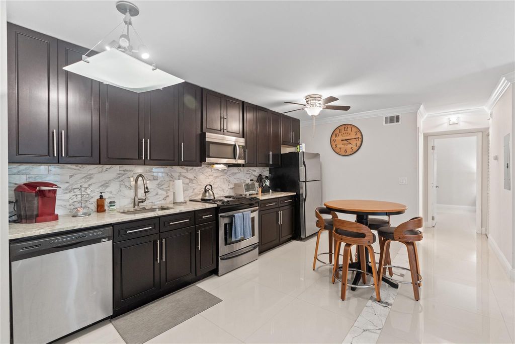 Photo of 567 Trace Circle #104, Deerfield Beach, FL 33441 (MLS # B26035193)