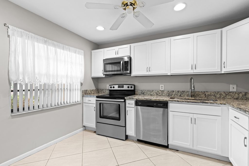 Photo of 9270 Vista Del Lago #E27, Boca Raton, FL 33428 (MLS # R11149672)