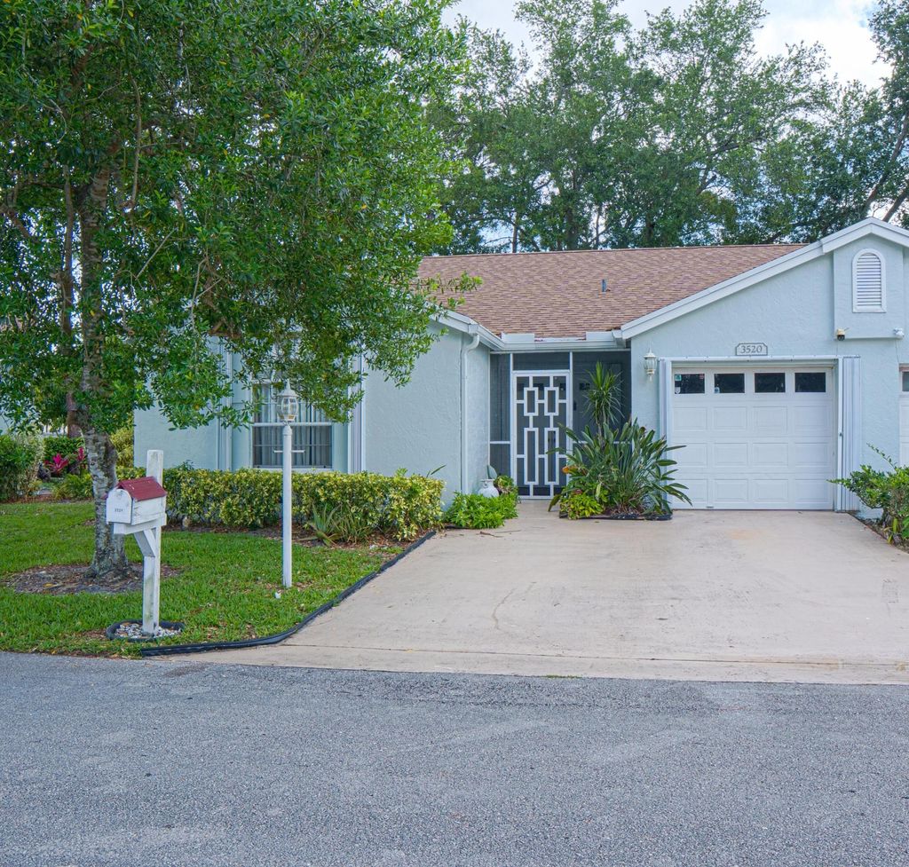Photo of 3520 Westminster Drive, Greenacres, FL 33463 (MLS # B26027724)