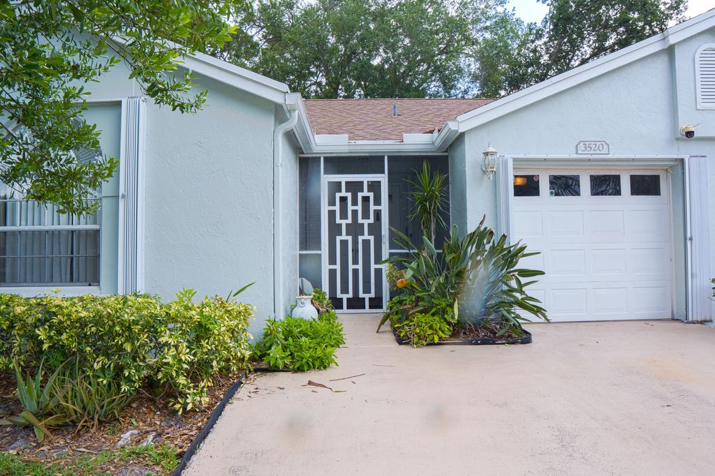 Photo of 3520 Westminster Drive, Greenacres, FL 33463 (MLS # B26027724)