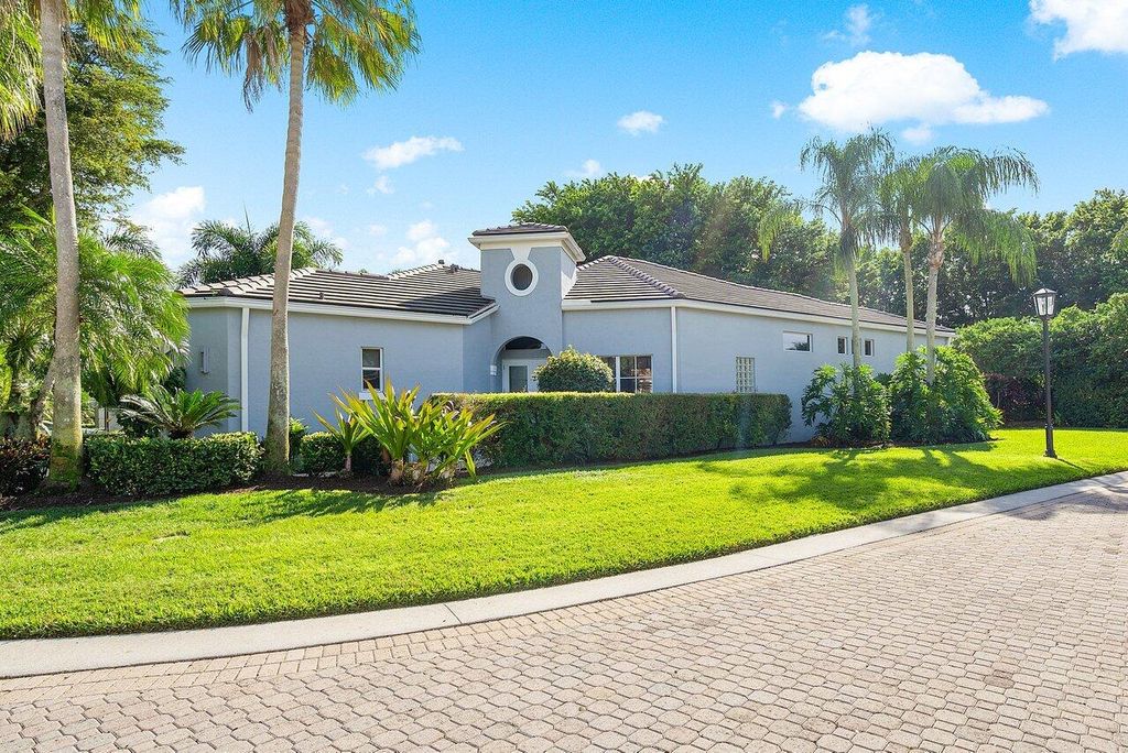 Photo of 126 Sunset Cove Lane, Palm Beach Gardens, FL 33418 (MLS # R10942659)