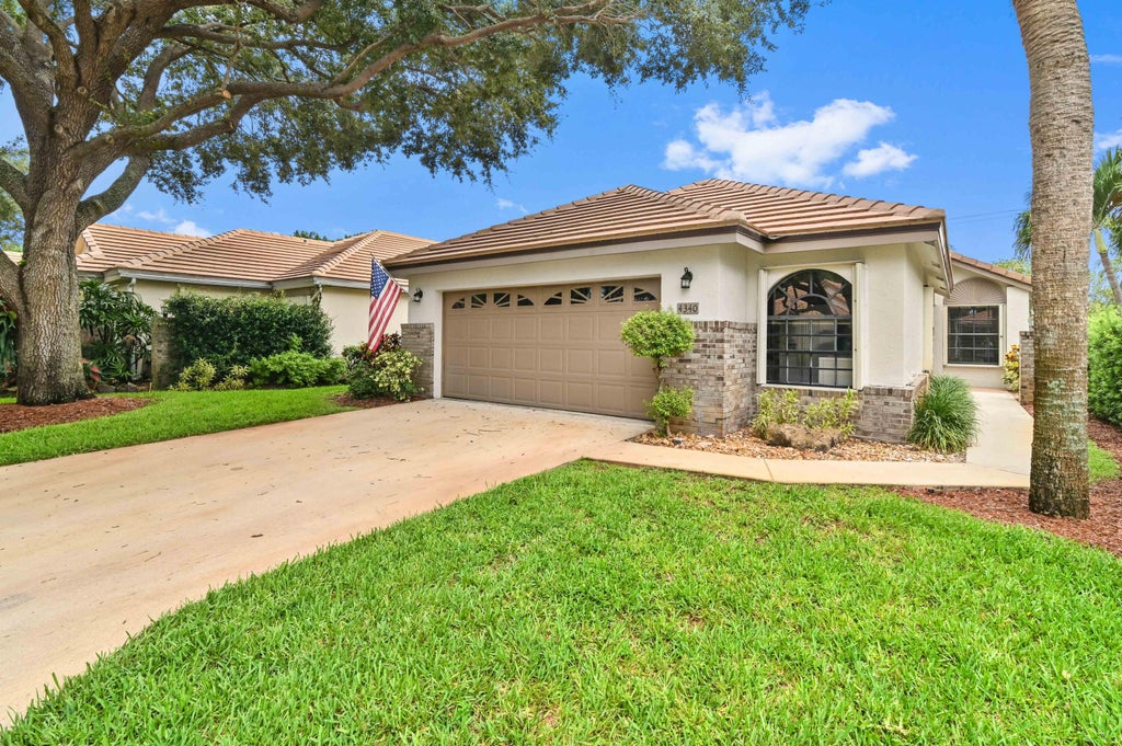 Photo of 4340 Sherwood Forest Drive, Delray Beach, FL 33445 (MLS # R10995743)
