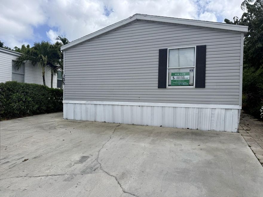 NO AGE RESTRICTION!  SPACIOUS, WELL MAINTAINED MANUFACTURED HOME WITH 3 BEDROOMS AND 2 BATHS. CENTRAL AIR IS LESS THEN 1 YEAR WITH SMART THERMOSTAT.  LOCATED IN COUNTRY LAKES, AN ALL AGES COMMUNITY WITH 2 SWIMMING POOLS, HOT TUB, 2 BASKET BASKETBALL COURTS, 2 PLAYGROUNDS, TENNIS COURT AND LOTS OF FUN ACTIVITIES.  ONLY A FEW MILES TO THE DESIRABLE BEACH OF DEERFIELD, THE WORRY-FREE SOUTH FLORIDA LIFESTYLE, WITH AMENITIES TO GALORE. CLOSE TO TRANSPORTATION, SCHOOLS  AND MAJOR HIGHWAYS.  LOT RENTAL $1,092 MONTLHY. IT WON'T LAST!!! CALL TODAY!