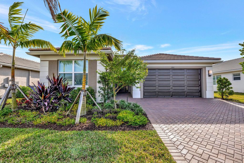 Photo of 11861 SW Poseidon Way, Port St Lucie, FL 34987 (MLS # R10949170)