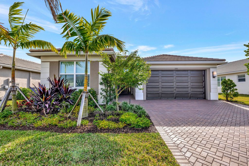 Photo of 11861 SW Poseidon Way, Port Saint Lucie, FL 34987 (MLS # R10949170)