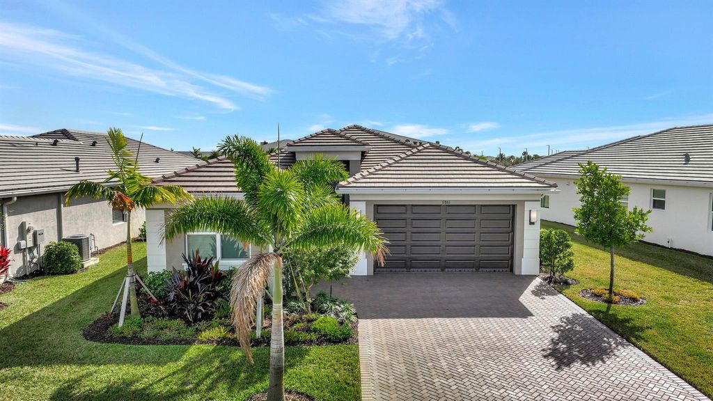 Photo of 11861 SW Poseidon Way, Port Saint Lucie, FL 34987 (MLS # R10949170)
