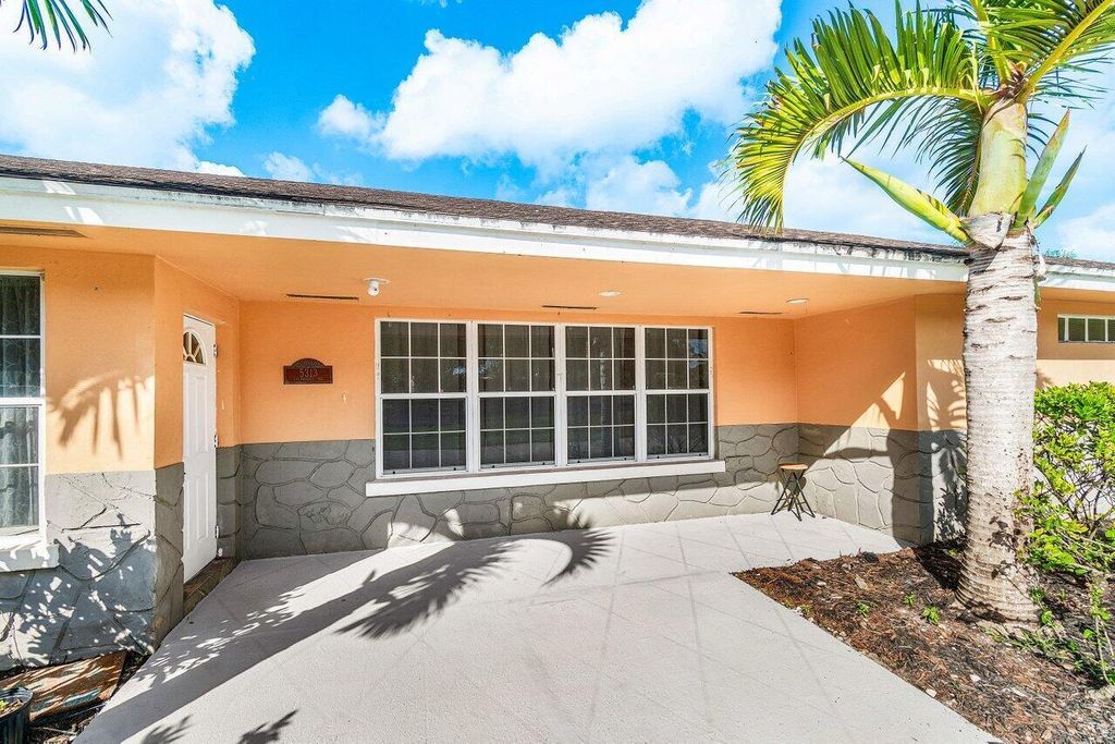 Photo of 5313 Colbright Road, Lake Worth, FL 33467 (MLS # B26026003)