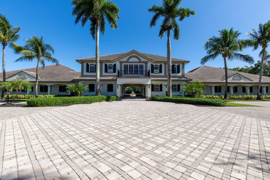 This stunning 5+ acre private equestrian facility is located in the exclusive gated community of Grand Prix Farms of the Equestrian Club. The luxurious property caters to the elite professional, boasting a beautiful 24-stall barn, plenty of paddock space and a large GGT arena. The magnificent barn features a 20x20 office with a half bath, a two bedroom/one bath grooms quarters, Stone-London stall system, two tack rooms, two feed rooms, laundry room and a second floor two bedroom/two bath owners suite.