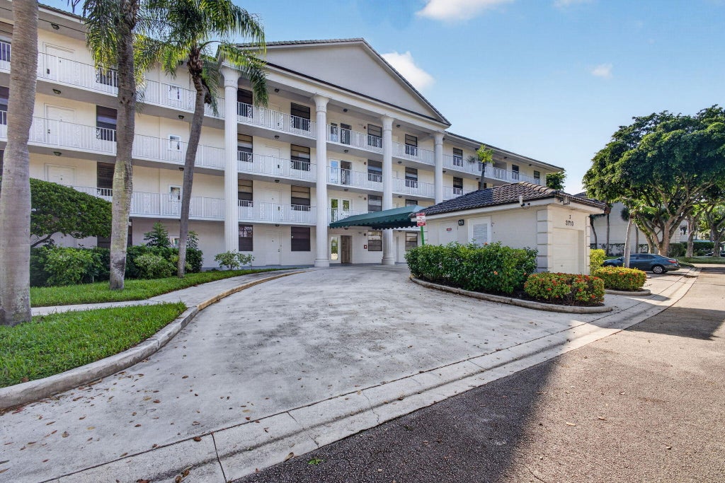 Photo of 3710 WHITEHALL Drive #401, West Palm Beach, FL 33401 (MLS # B26087446)
