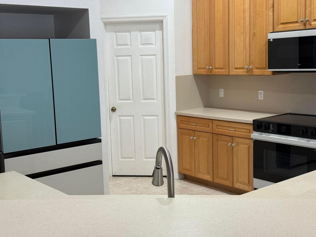 Photo of 5824 NW Zenith Drive, Port Saint Lucie, FL 34986 (MLS # R11167737)