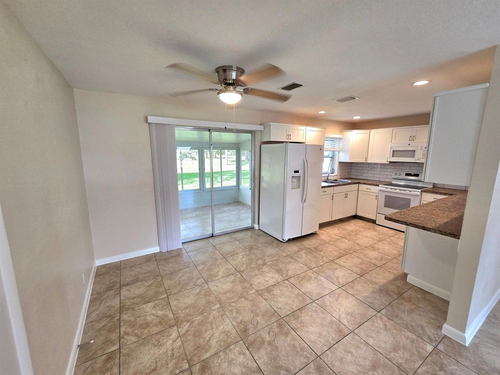 Photo of 7902 Lockwood Drive, Fort Pierce, FL 34951 (MLS # R11083920)