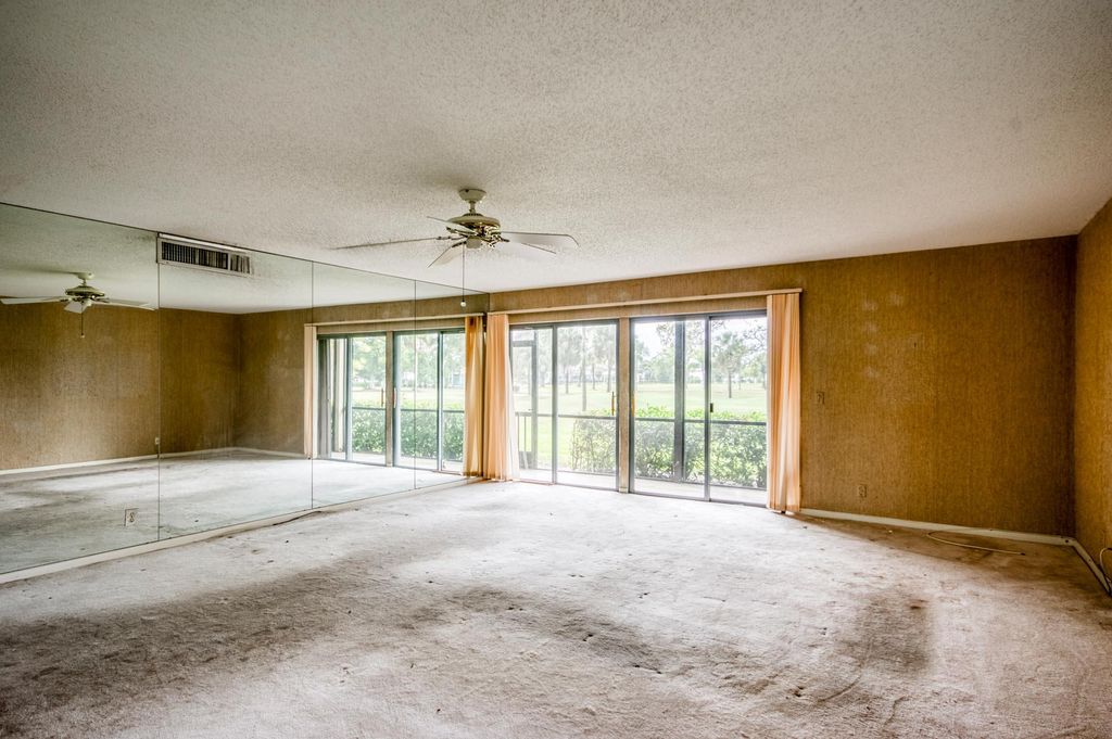 Photo of 18430 SE Wood Haven Lane #J, Jupiter, FL 33469 (MLS # R11053278)