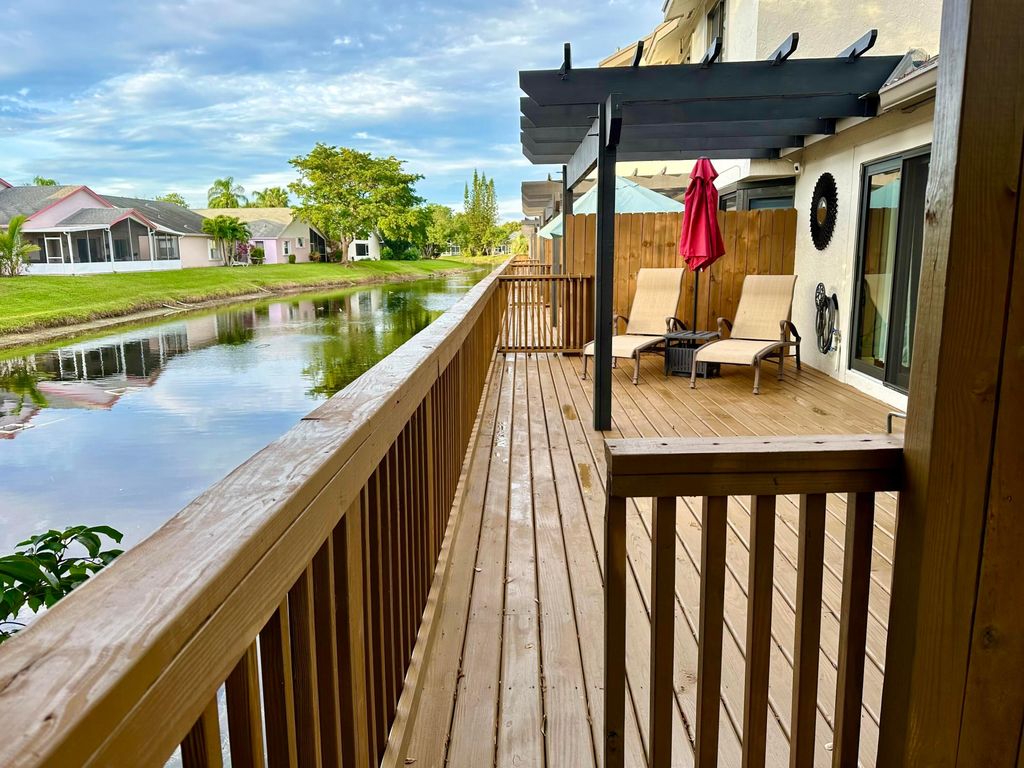 Photo of 101 Landings Boulevard, Greenacres, FL 33413 (MLS # R10937290)