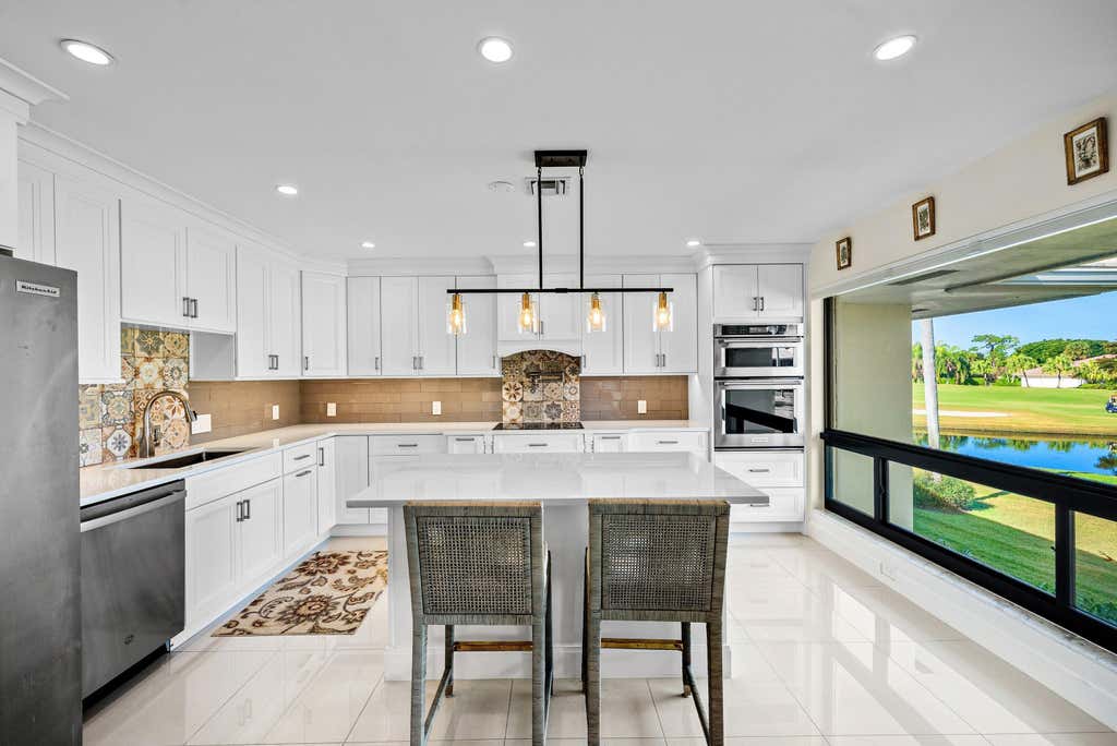 Photo of 3637 Quail Ridge Drive S #Bobwhite A, Boynton Beach, FL 33436 (MLS # B26067015)