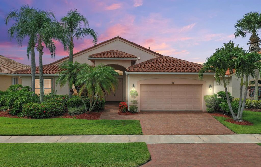 Photo of 509 NW Blue Lake Drive, Port Saint Lucie, FL 34986 (MLS # R11130493)