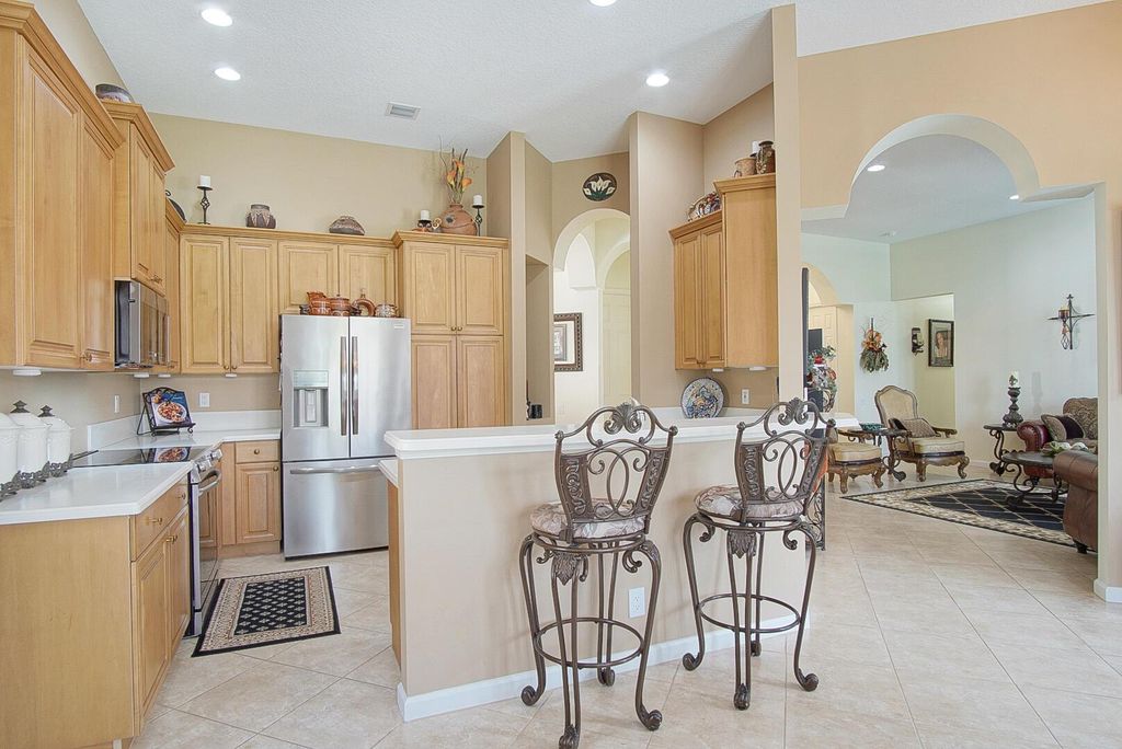 Photo of 509 NW Blue Lake Drive, Port Saint Lucie, FL 34986 (MLS # R11130493)