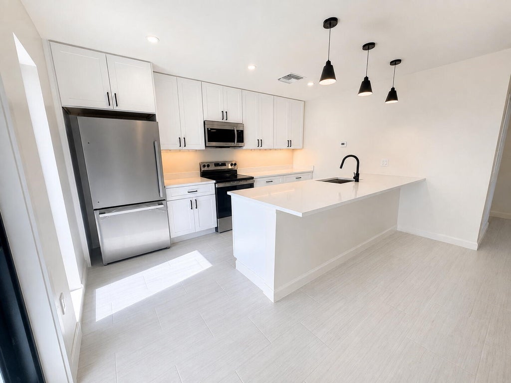 Photo of 274 SE 9th Avenue #3, Deerfield Beach, FL 33441 (MLS # B26079043)