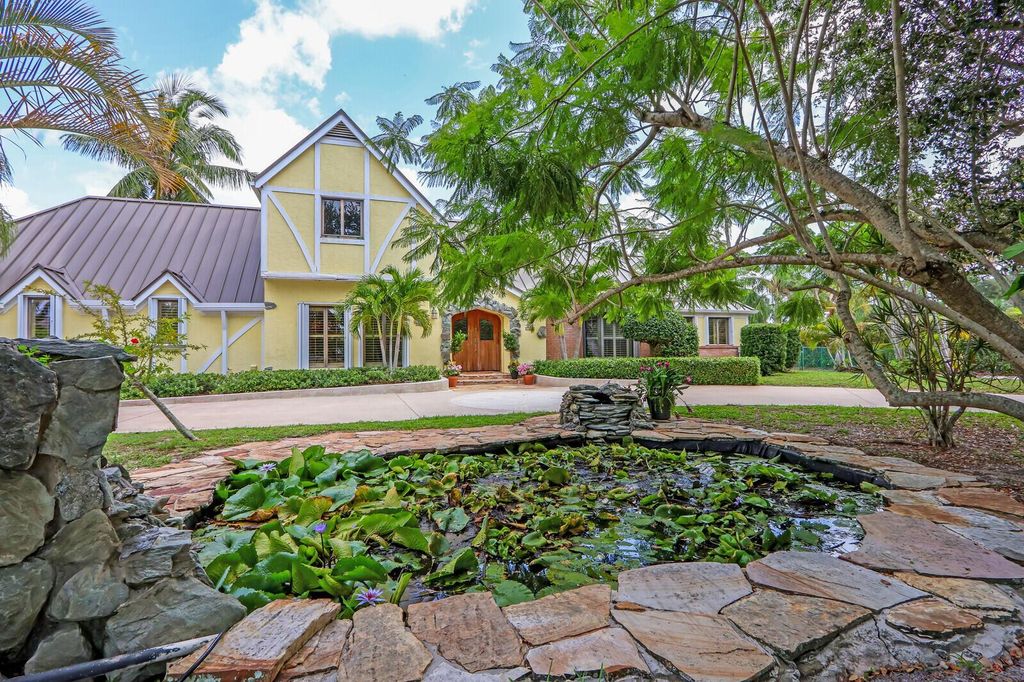 Photo of 8433 SE Woodmere Street, Hobe Sound, FL 33455 (MLS # R10903924)