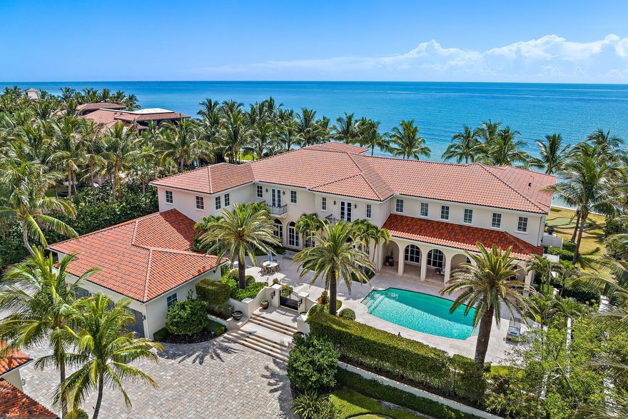 ''Villa Oceano Azul'' -1400 S Ocean Blvd. Manalapan, Florida.  This magnificent estate residence is situated between the Atlantic Ocean and the Intracoastal Waterway in the exclusive estate section of Manalapan.  As its name implies, this extraordinary property totals nearly 2 acres with over 200 feet of direct oceanfront and an accompanying 200 feet on the Intracoastal Waterway equipped with a full-service concrete dock. 

Offered fully furnished and turnkey with transitional coastal inspired interiors by Marc-Michaels Interior Design, this stunning European-inspired Villa creates graciously proportioned rooms in a grand total of 20,712 square feet with seven bedrooms, nine full and four half baths, including a guest house. Across the motor court from the main residence, the private guest house includes a large living room, full kitchen, bedroom, full bath, separate powder room, laundry room and an attached three car garage. 

Amenities include CGI impact-glass windows and exterior doors, two elevators, multiple laundry rooms, 11 zone HVAC system, Crestron smart home automation, and a whole house generator.

Few places in the world rival the lifestyle offered in Manalapan, an idyllic oceanfront town located on the barrier island immediately south of Palm Beach.  Manalapan residents enjoy deeded club privileges at the Five-Diamond Eau Palm Beach Resort & Spa.

The information herein is deemed reliable and subject to errors, omissions or changes without notice.  The information and dimensions have been derived from architectural plans and county records.