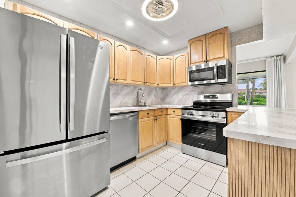 Photo of 1149 NW 13th Street #Apt 6, Boca Raton, FL 33486 (MLS # B26083402)