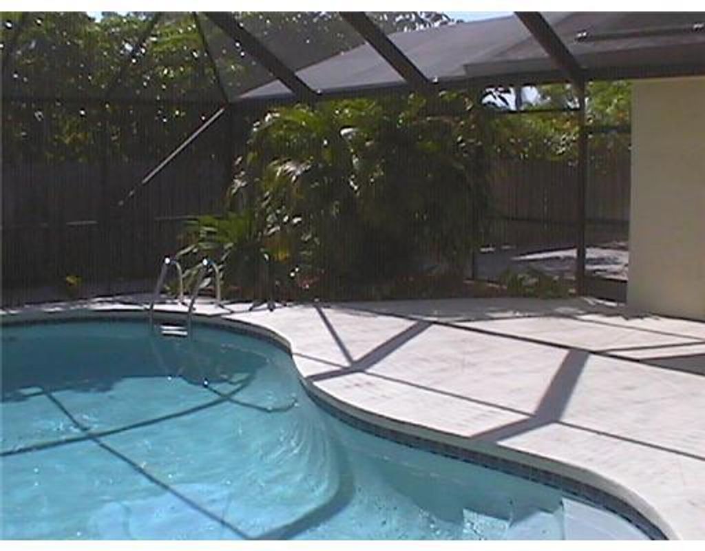 Photo of 6050 Amberwoods Drive, Boca Raton, FL 33433 (MLS # B26018682)