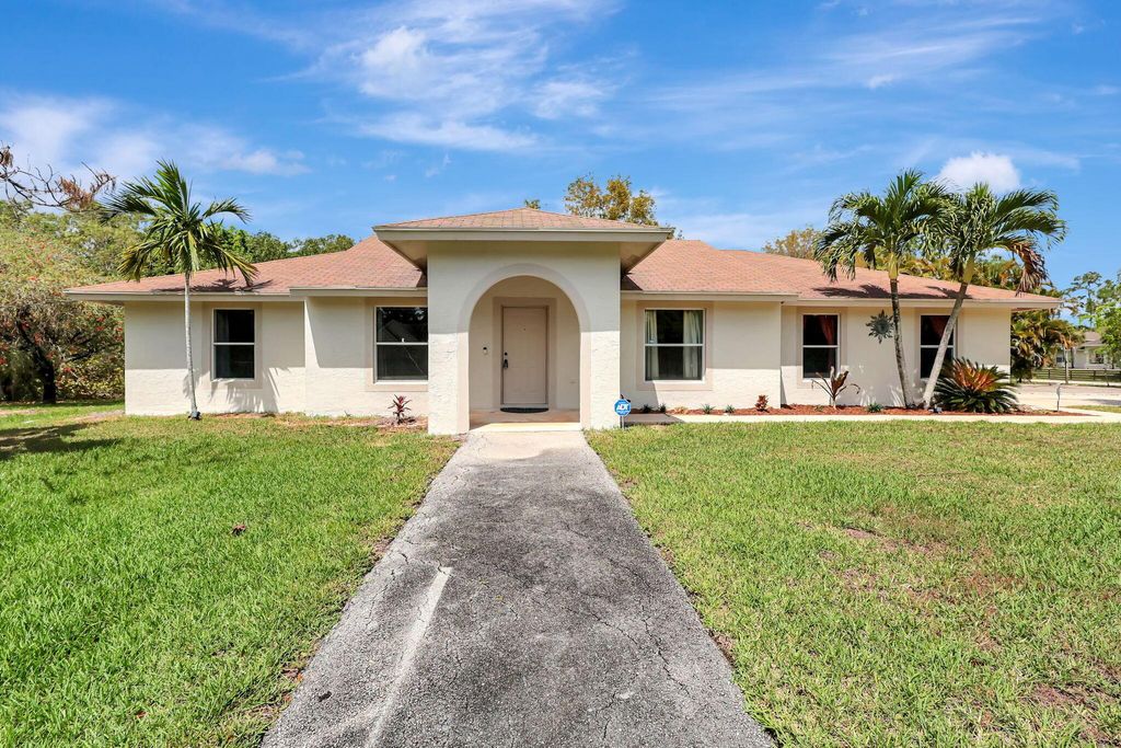 Photo of 12021 61st Street N, West Palm Beach, FL 33412 (MLS # R10972844)