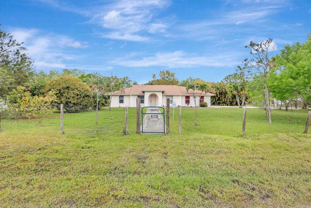 Photo of 12021 61st Street N, West Palm Beach, FL 33412 (MLS # R10972844)