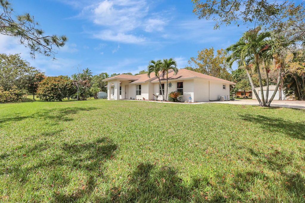 Photo of 12021 61st Street N, West Palm Beach, FL 33412 (MLS # R10972844)