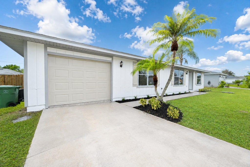 Photo of 2068 SW Morelia Lane, Port Saint Lucie, FL 34953 (MLS # B26063613)