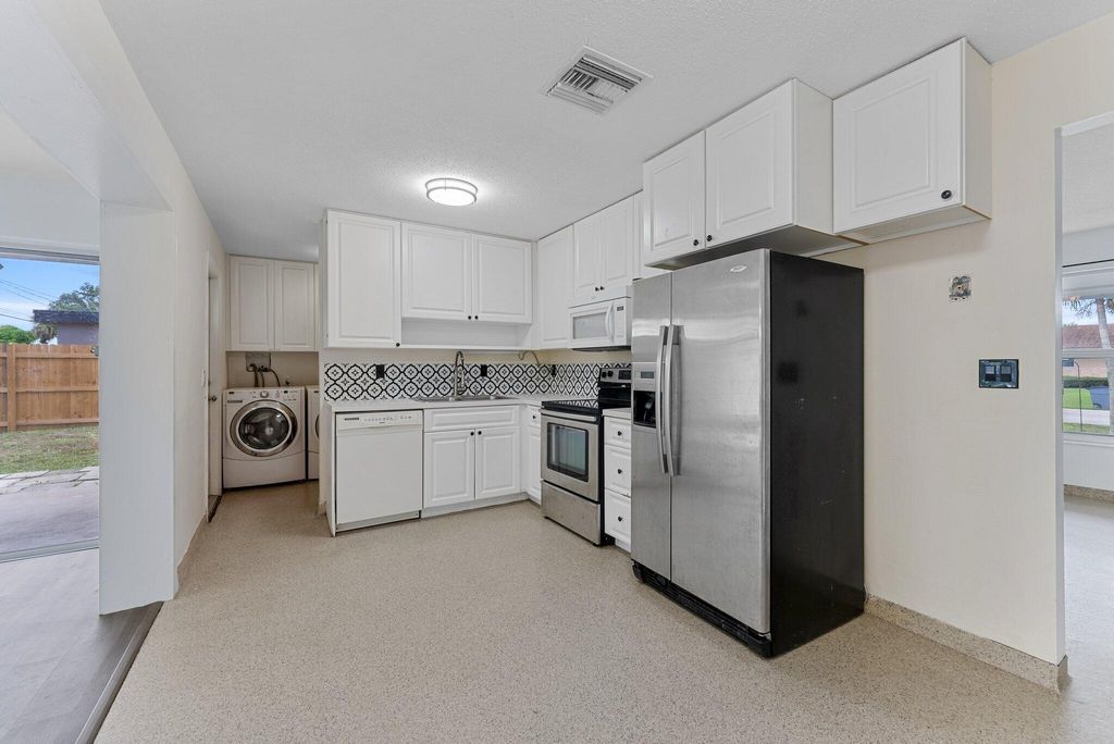 Photo of 4331 Birdwood Street, Palm Beach Gardens, FL 33410 (MLS # R10993023)