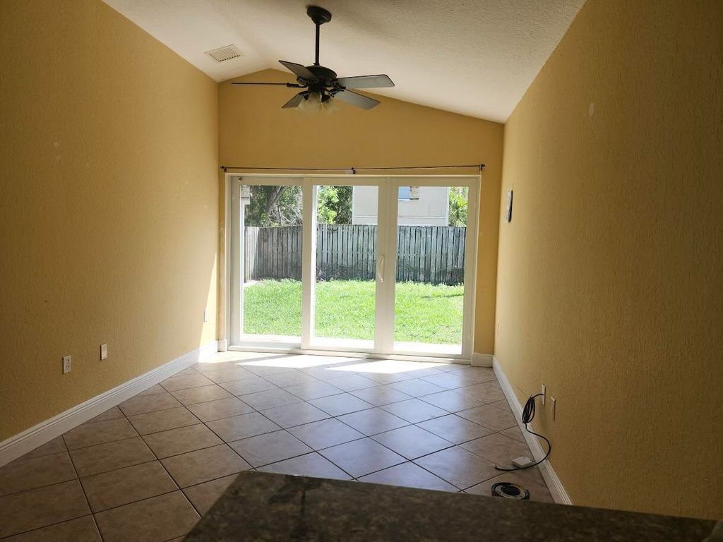 Photo of 4824 Cambridge Street, Greenacres, FL 33463 (MLS # B26013935)