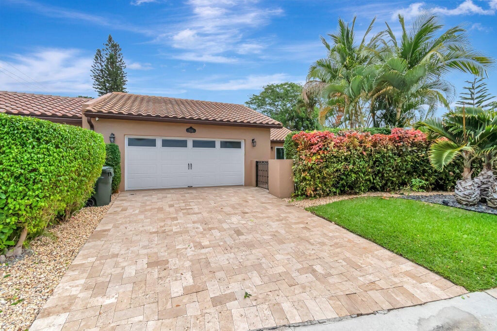Photo of 734 Camino Gardens Lane, Boca Raton, FL 33432 (MLS # B26073944)
