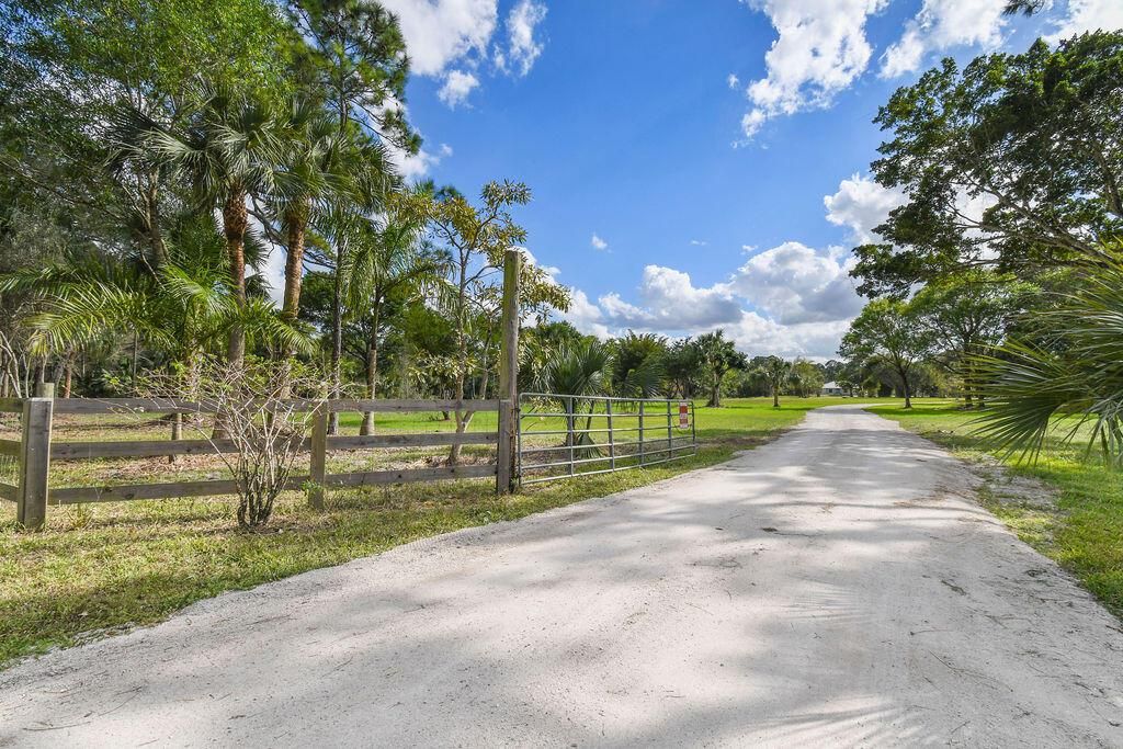 Photo of 10792 Randolph Siding Road, Jupiter, FL 33478 (MLS # R10863541)