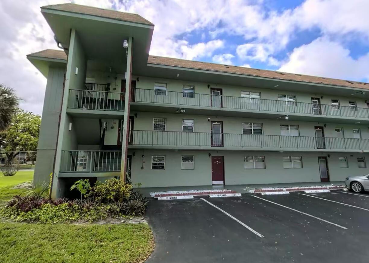 Move in quickly with FAST association approval as little as one week! This updated first-floor unit has been FRESHLY PAINTED and professionally CLEANED, with VINYL FLOORING throughout, offering a welcoming and SPACIOUS area. Enjoy cooking in an UPDATED KITCHEN with stainless steel appliances and relax in your SCREENED PATIO. Reserved parking spot is right outside your door for convenience, and plenty of guest parking in the community!