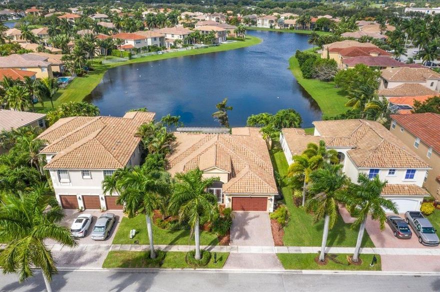 WOW! AN ABSOLUTE GEM!  Come and see this lovely single family home nestled in the community of Journey's End! As soon as you walk in, you are surrounded by a breathtaking lake view! 
 House features; engineered wood flooring, deep walk in closets, newer kitchen, SS appliances, granite countertops, dark wood like cabinetry, high ceilings, laundry room - washer/dryer (whirlpool). House comes with;  aluminum shutters, fire rated garage.  Backyard features; travertine flooring , recessed down lighting, beautiful fountain off to the side, units for fans and more! Make this your dream home today!