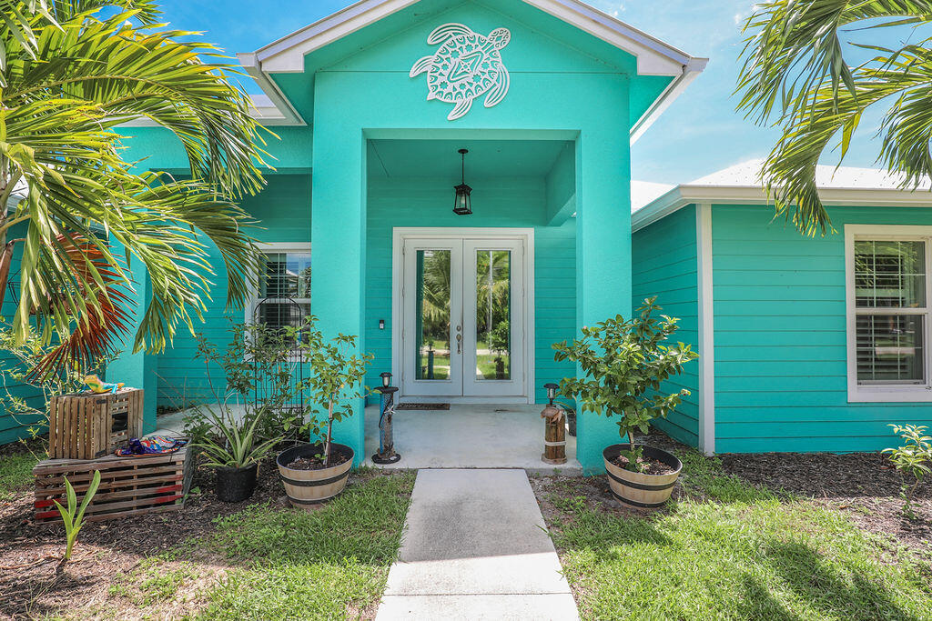 Welcome to this move-in ready home that combines comfort, style, and peace of mind. This property is built with hurricane-ready features while offering a warm and inviting atmosphere in a family-friendly neighborhood.Inside, you will find an open layout with tile flooring throughout that provides both durability and low maintenance. The kitchen is the centerpiece of the home with an extended granite island that offers plenty of space for cooking, dining, and entertaining. Step outside to enjoy a screened patio perfect for relaxing or hosting gatherings. The fenced yard offers security and space. Do not miss the opportunity to own this beautiful 3 bedroom, 2 bath home with features that make everyday living easy and enjoyable. Schedule your showing today!