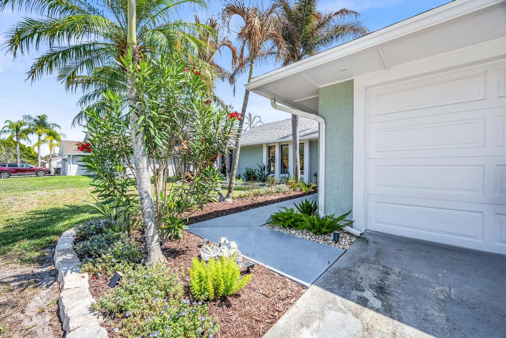 Photo of 757 NE Eastlake Street, Port Saint Lucie, FL 34983 (MLS # B26010087)