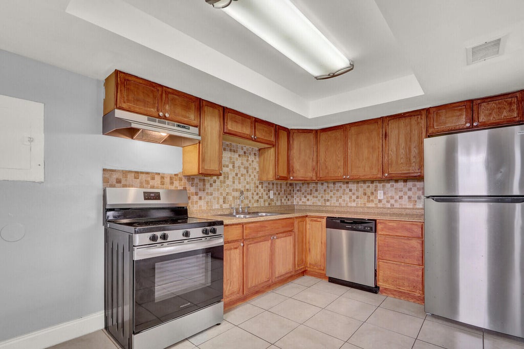 Photo of 3204 Louisiana Avenue #D, Fort Pierce, FL 34947 (MLS # B26068303)