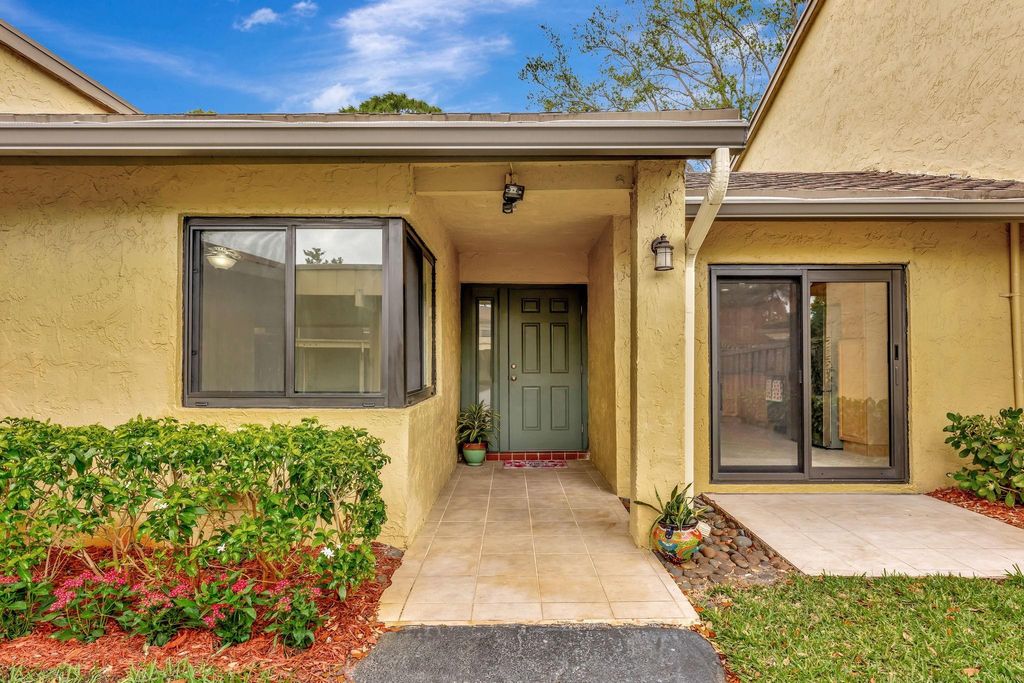 Photo of 2039 Deer Creek Woodlands Way #2039, Deerfield Beach, FL 33442 (MLS # F10489339)