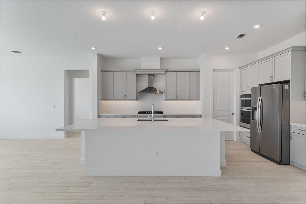 Photo of 10647 SW Vineyard Drive, Port Saint Lucie, FL 34987 (MLS # R11095938)