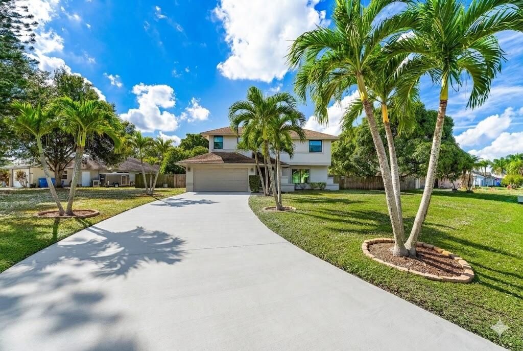 Photo of 208 Las Palmas Street, Royal Palm Beach, FL 33411 (MLS # R11150981)