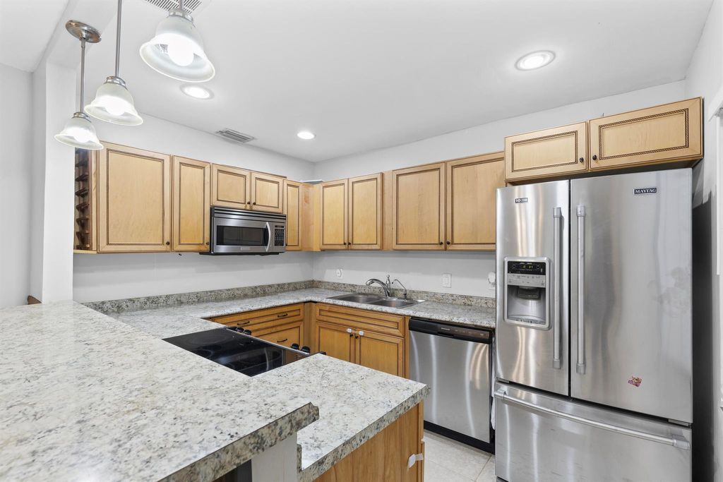 Photo of 1920 Palmland Drive #C, Boynton Beach, FL 33436 (MLS # R11093688)