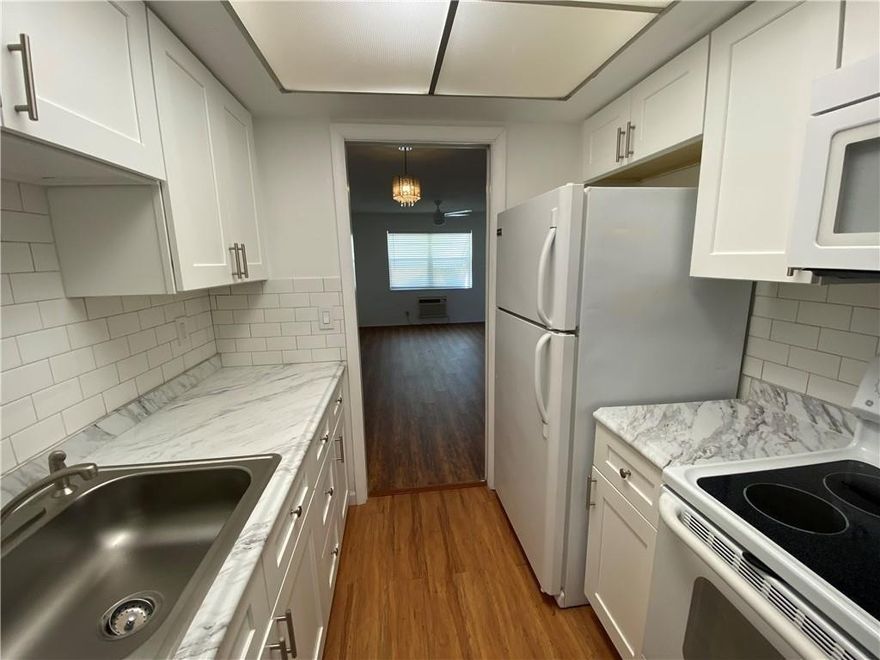 Spacious 1st floor unit in this all ages condo! Convenient location, less than 1/2 mile to US1 and Lighthouse Point! Remodeled kitchen, extra storage space. Ready for purchase and to rent out!