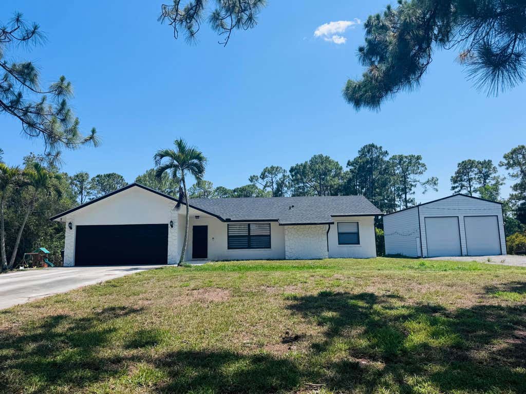 Photo of 14196 N 77TH Place N, The Acreage, FL 33470 (MLS # B26062650)