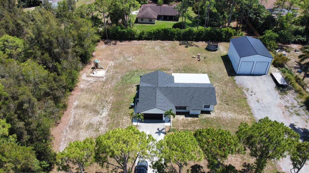 Photo of 14196 N 77TH Place N, The Acreage, FL 33470 (MLS # B26062650)