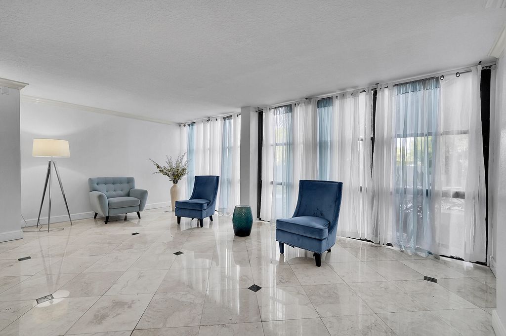 Photo of 1000 Parkview Drive #306, Hallandale Beach, FL 33009 (MLS # B26047274)