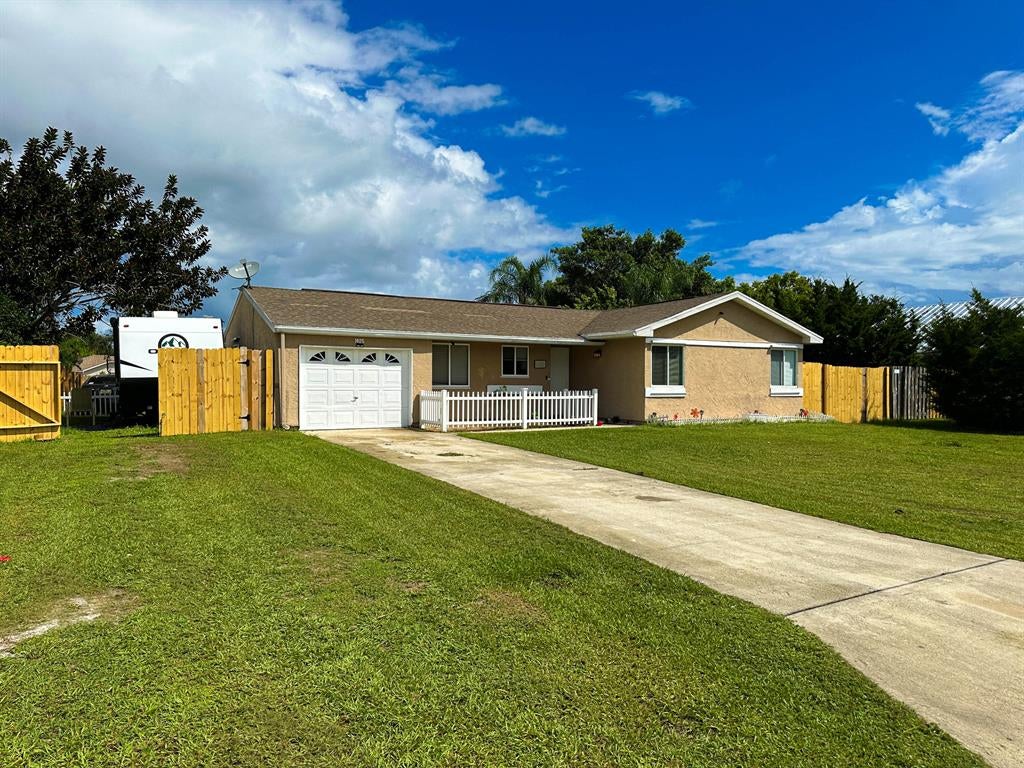 Photo of 1925 SE West Dunbrooke Circle Cir, Port St Lucie, FL 34953 (MLS # R10834149)