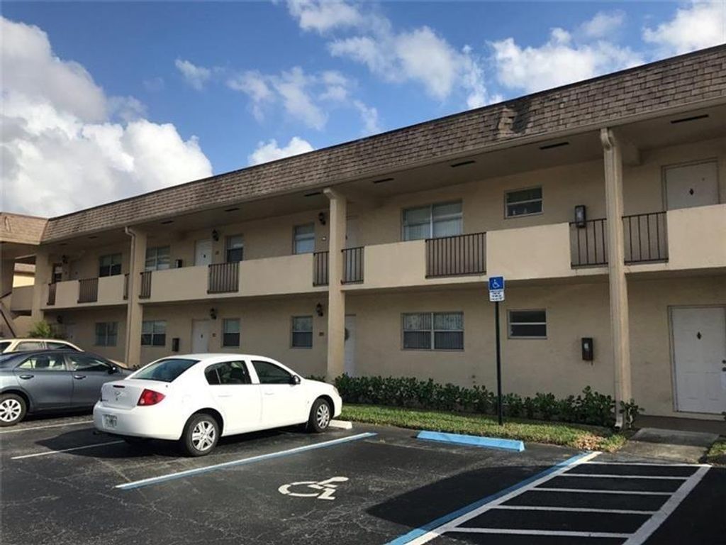 Photo of 7420 NW 85th Ct #104, Tamarac, FL 33321 (MLS # F10343489)