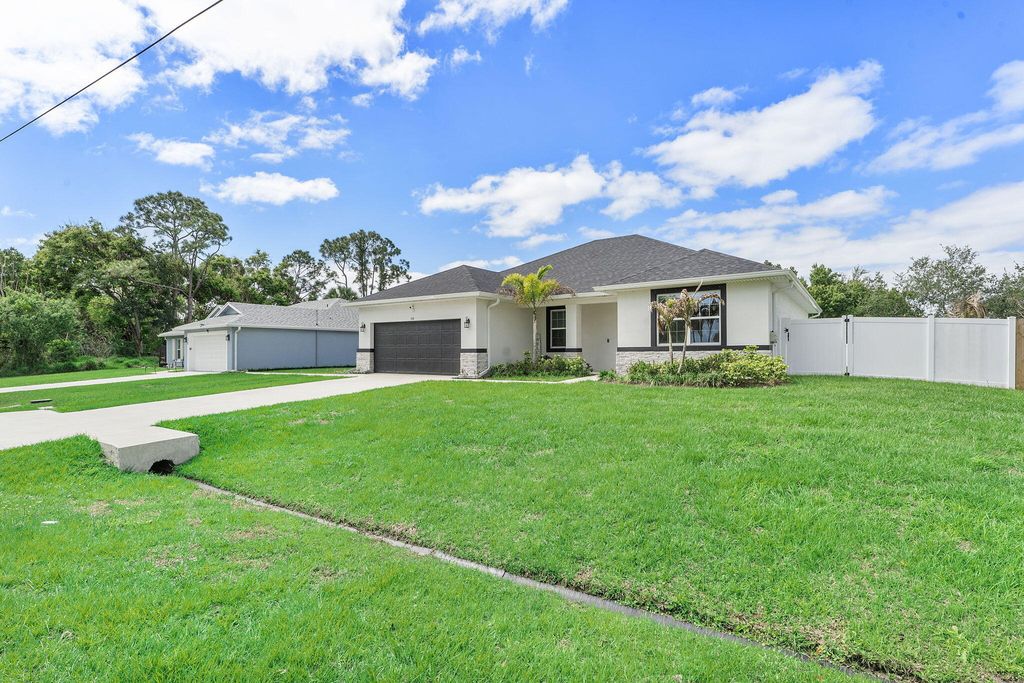 Photo of 532 SW Sansom Lane, Port Saint Lucie, FL 34953 (MLS # B26017488)