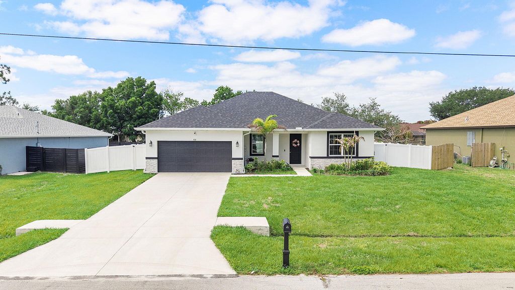 Photo of 532 SW Sansom Lane, Port Saint Lucie, FL 34953 (MLS # B26017488)